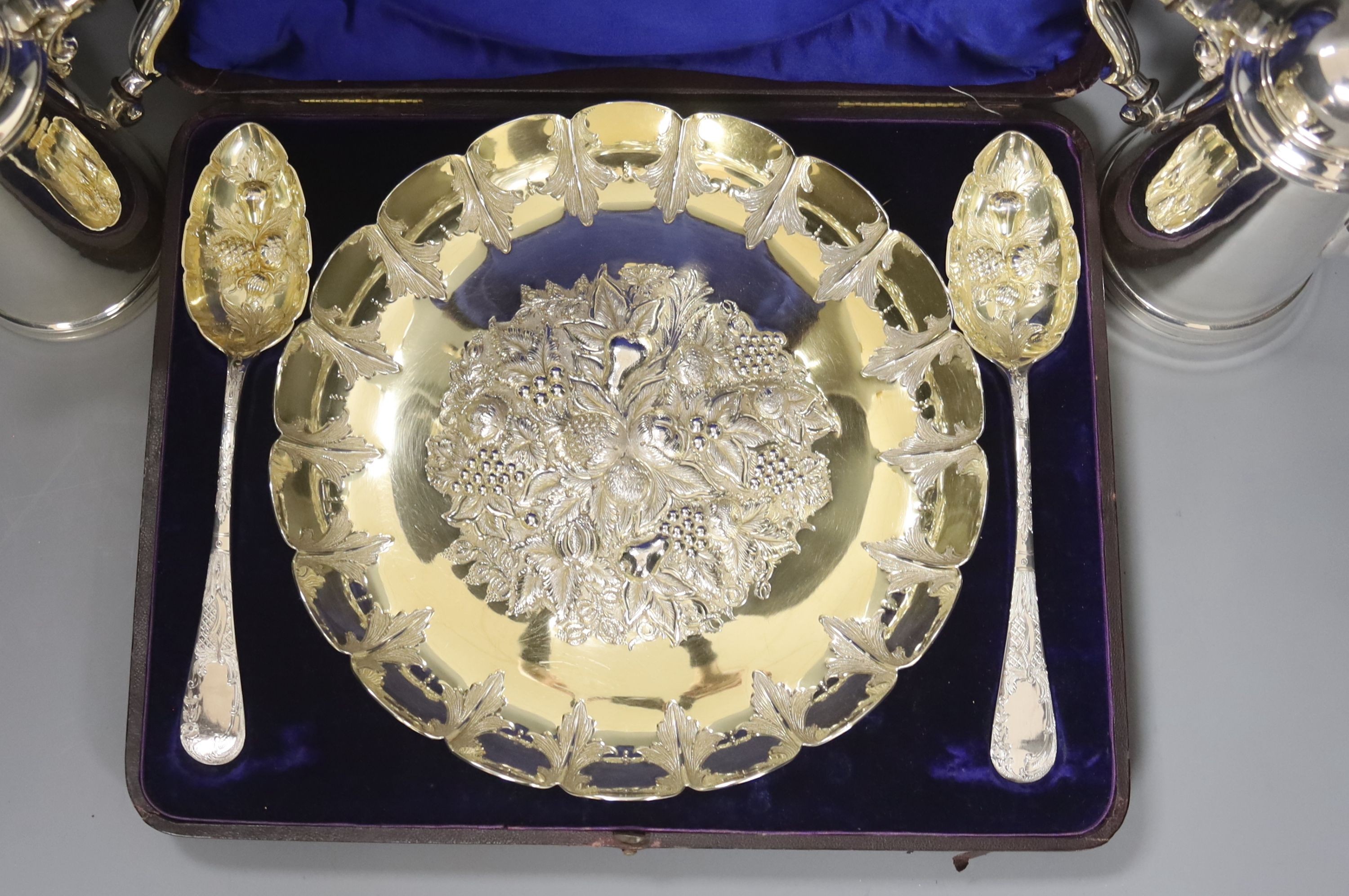 A quantity of plated items including cased dessert bowl and servers, cafe au lait pair and cased items, coasters, wine coaster and pair of condiments